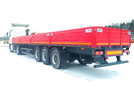 Полуприцеп бортовой МАЗ 975800-2010 трехосный